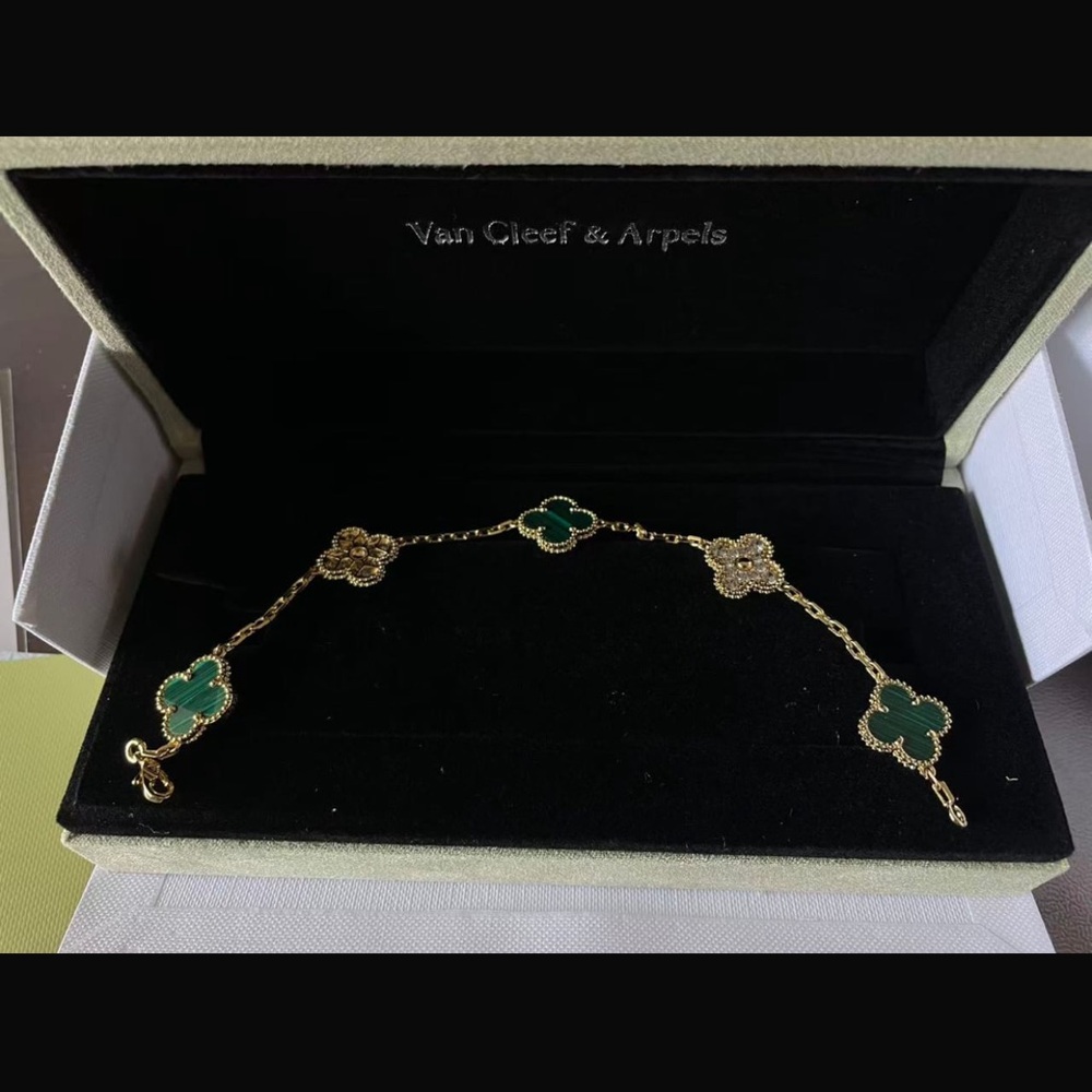 Elegant Gold Bracelet with Green Clover Charms